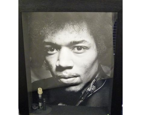 Jimi Hendrix Experience, studio microphone in a framed presentation. The presentation includes a microphone that was owned an