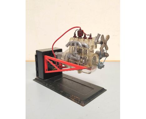 1950s German Gescha battery operated transparent 4-cylinder model engine.