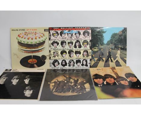 Collection of Rolling Stones and Beatles records to include Let It Bleed, Some Girls, Abbey Road, etc (6). 