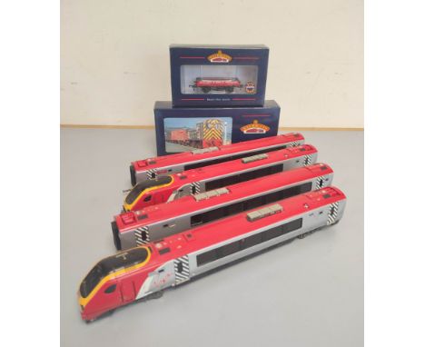 Bachmann. Two 00 gauge Bachmann Branchline 32-602 Class 220 Voyager locomotives and tenders, a boxed 04 BR Diesel Shunter 31-