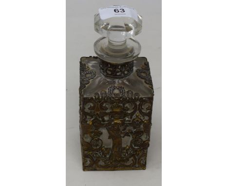 A 19th century  Continental decanter, with gilt metal mounts decorated with mythical beasts and maidens, 17 cm high 