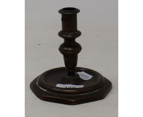 An 18th century style candlestick, on an octagonal base, 12 cm high 
