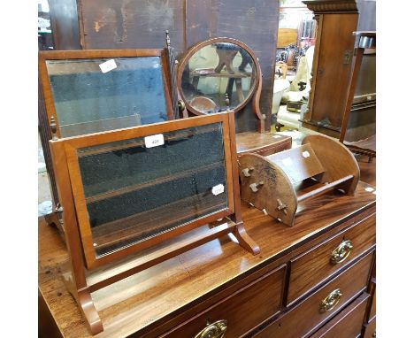 A 19th century mahogany dressing mirror, 46 cm wide, an oval lamp table, two mirrors, and an oak bookstand (5) 