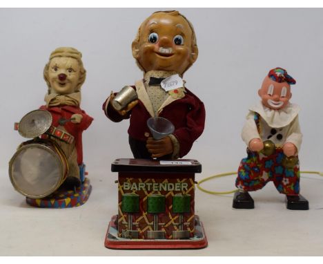 A 1960's automaton Bar Tender, and two similar clowns (3) 