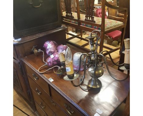 A pair of early 20th century brass gas wall lights, with cranberry glass shades and a brass five branch chandelier (3) 