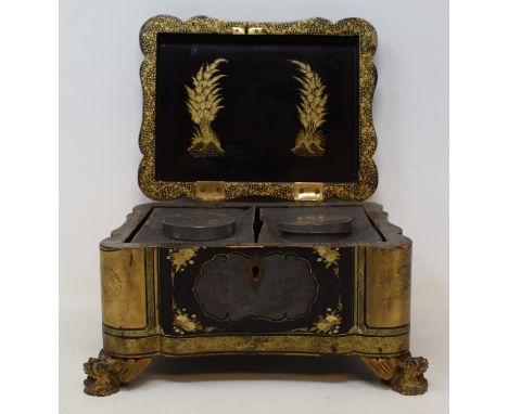 A 19th century Chinese lacquered  tea caddy, with two canisters, on carved dragons feet, 22 cm widesee images 