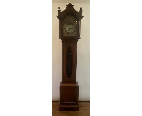 A longcase clock, the 29.5 cm arch square dial with a silvered chapter ring having Roman numerals, the silvered centre with s