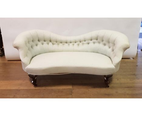 A 19th century button back sofa on carved cabriole legs, 180 cm wide 