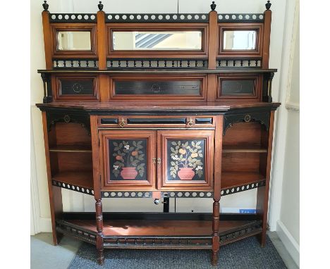 A late 19th century Aesthetic Movement walnut, ebonised and painted side cabinet, the raised back with three bevel edge mirro