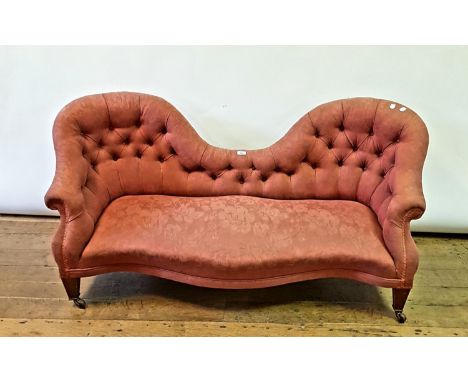 A 19th century button back sofa, on mahogany legs, 150 cm wide 