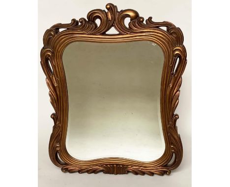 WALL MIRROR, Italian style chantilly gilded deep scrolling frame and shaped bevelled mirror plate, 125cm H x 102cm W. 