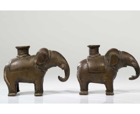 BronzeIndia, 16th century Dimensions: Height 6 cm Wide 8 cm Depth 3 cmWeight: 452 grams both Pair of identical elephants stan