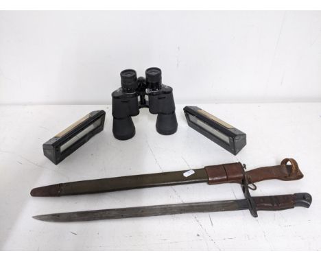 An American WWI Remington bayonet in leather scabbard, 43cms long blade; along with two periscope heads, and a Scheffel 10 x 