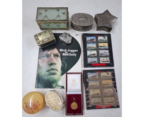 A small mixed lot comprising a 'Mick Jagger is Ned Kelly' booklet, 2 vintage Cunard collectors matchboxes, decorative trinket