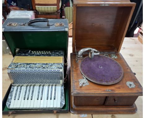 A vintage Starr gramophone in an treen case together with an Estrella piano accordion in travel caseLocation:1.4If there is n