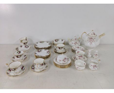 A Royal Albert celebration bone china part tea service with cups, saucers, bowls and other items, together with a part coffee