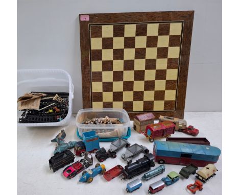 Vintage toys A/F to include a chess board with Italian metal pieces, diecast model vehicles, a Dinky racing car and toy train
