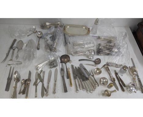 A collection of mostly silver plated flatware, a candle snuffer, cake forks, a corkscrew, a meat fork, a tray with two handle