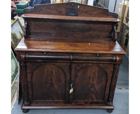 A Victorian mahogany chiffonier having a raised back, two drawers and cupboard doors below 142cm h x 126.5cm w Location:If th