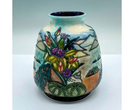 A stunning scenic vase of a coastline with purple flowers and green urchin shells. Beautiful detailed tube lining. Moorcroft 