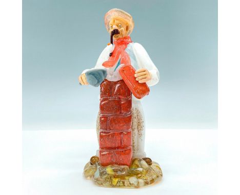 Whimsical glass figurine handmade depicting a man laying bricks while smoking a pipe. Artist: Jaroslav BrychaIssued: 1950'sDi