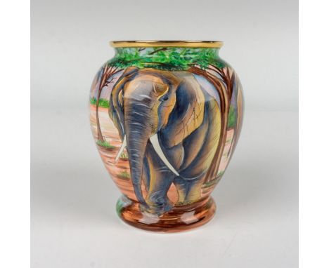 Hand painted vase depicting a herd of elephants at the watering hole. Moorcroft backstamp. Artist's initials on the base. Thi