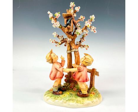 Part of the Century Collection. Figural features two girls under blooming tree with black bird singing. Hummel impressed mark