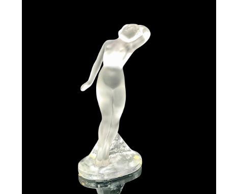 A stunning figure of a frosted dancer on a clear crystal base. Her left arm over her head. Lalique France etched on the side 