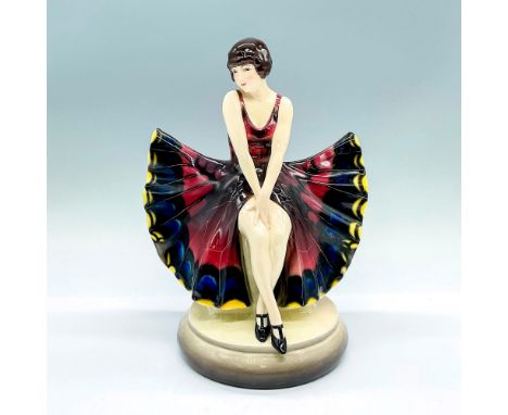 Art Deco figure of a seated woman in a butterfly dress. Goldscheider backstamp. Artist: Josef LorenzlIssued: c. 1920sDimensio