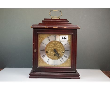 A vintage German wooden cased chiming mantle clock. 