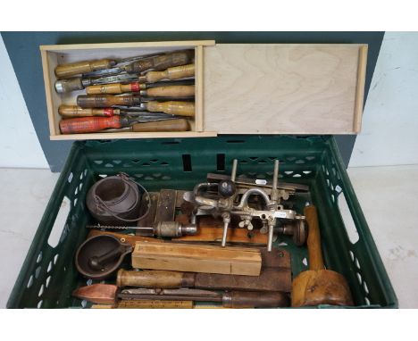 A collection of vintage carpenters tools to include MOD stamped tools, USA Stanley no. 45 plane, Chisels, Spirit Levels, etc 