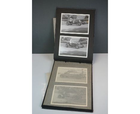 A vintage photograph album with vintage black and white photos of motor racing cars. 