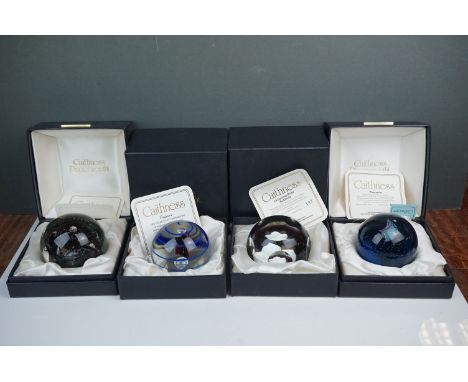 Four Cased Caithness Glass Paperweights including Black Gem, Christmas Rose Sulphide, Pirouette and Enigma, all limited editi