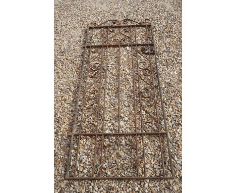 A vintage wrought iron Garden gate. 
