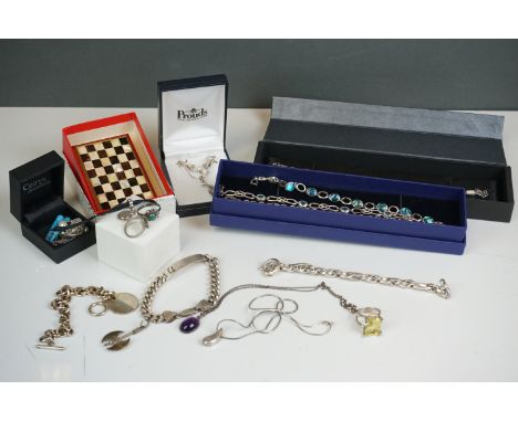 Silver jewellery to include rings, topaz bracelet, opal bracelet, amethyst pendant necklace, Viking axe head pendant, togethe