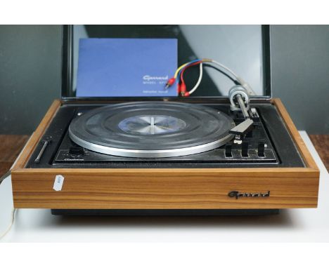 A vintage Garrard Model AP76 record deck / turntable complete with instruction. 