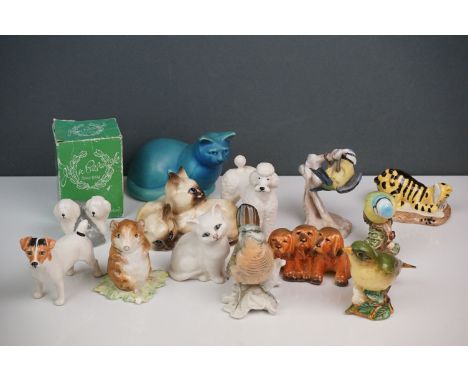 A small collection of ceramic animals to include Beswick &amp; Royal Doulton examples. 