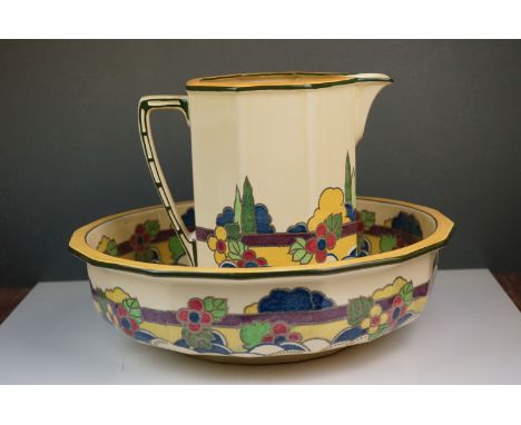 A vintage Art Deco Royal Doulton wash jug and basin with registration mark to base. 