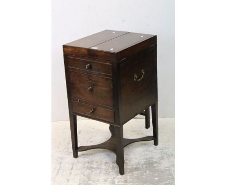 George III Mahogany Nightstand, the double hinged top opening to a pull-up mirror and lift up panel with fitted shelf (a/f), 