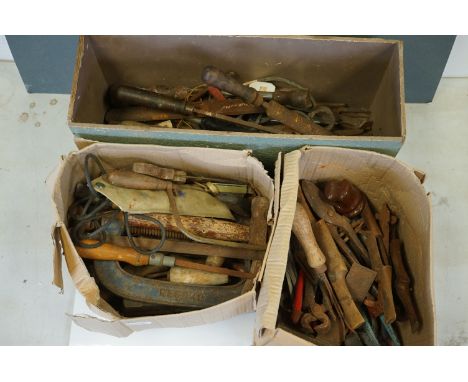 A collection of vintage tools to include Chisels, clamps and hammers etc. 