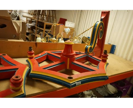 Two vintage painted wooden fairground attraction light fittings. 