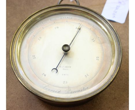 A lacquered brass aneroid barometer, retailed by E. J. Dent, Paris, mid 19th centuryThe 4 inch circular silvered register ins