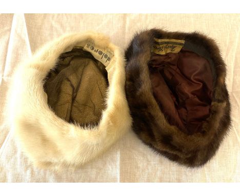 2 Vintage fur hats with labels 
