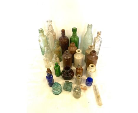 Selection of vintage glass and pottery bottles 