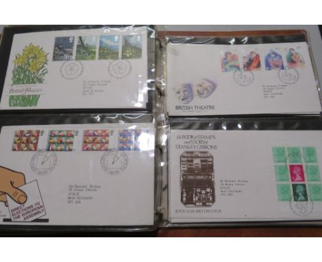 AN ALBUM OF POST OFFICE FIRST DAY COVERS,  TOGETHER WITH THREE COMMEMORATIVE COINS AND STAMPS FIRST DAY COVERS AND AN AUTOGRA