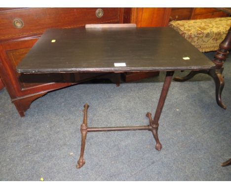 A VINTAGE CAST BED TABLE