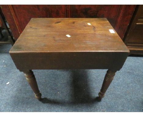 AN ANTIQUE MAHOGANY COMMODE STOOL