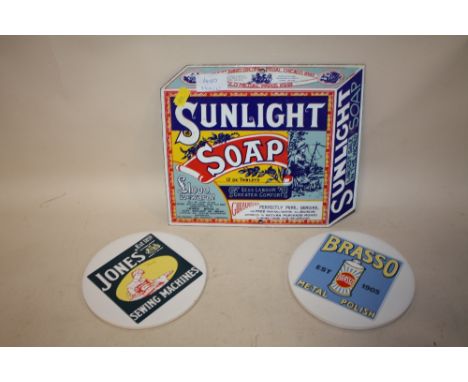 A REPRODUCTION ENAMEL ADVERTISING SIGN FOR SUNLIGHT SOAP TOGETHER WITH TWO CERAMIC ADVERTISING COASTERS