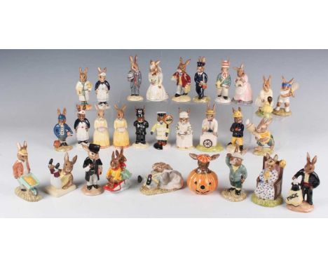 Twenty-nine Royal Doulton Bunnykins figures, including Olympic, Ace, Cook, Magician, Gardener, Policeman, Ice Cream, Hallowee