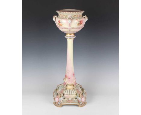 A Royal Worcester Prismatic Enamels decorated tall oil lamp base, dated 1895, the bulbous top painted with flowers between mo